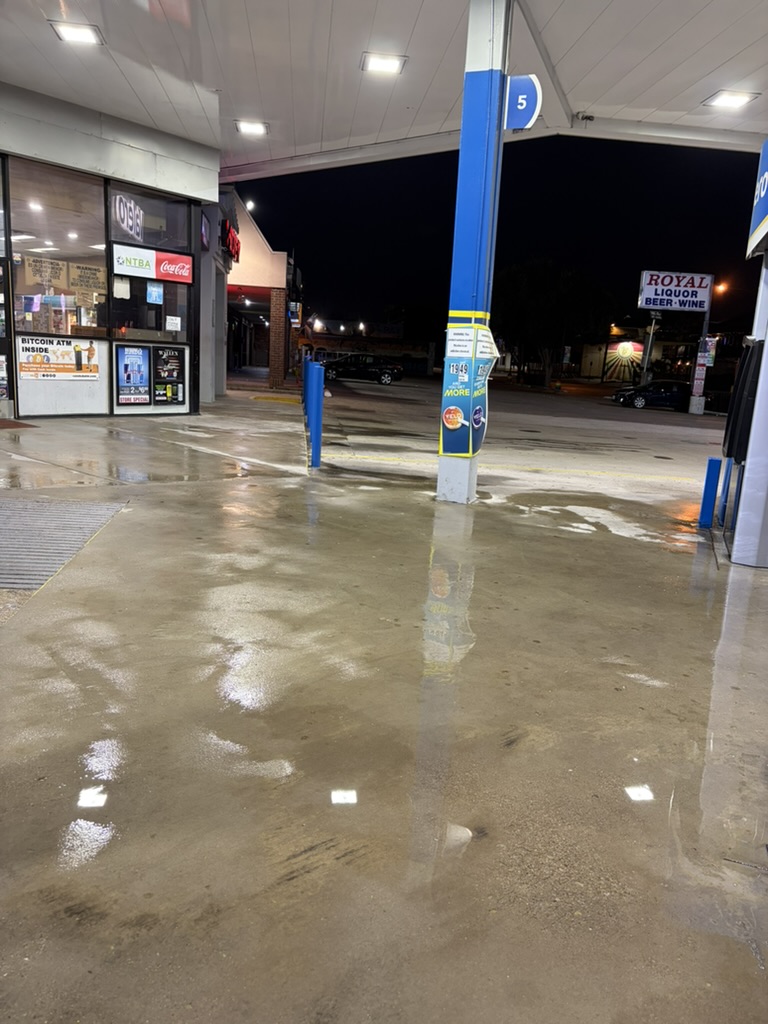 Storefront and sidewalk after pressure washing at a commercial property