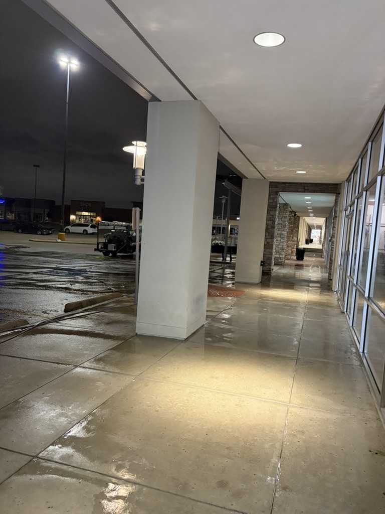 Commercial walkway cleaned of grime after pressure washing in North DFW